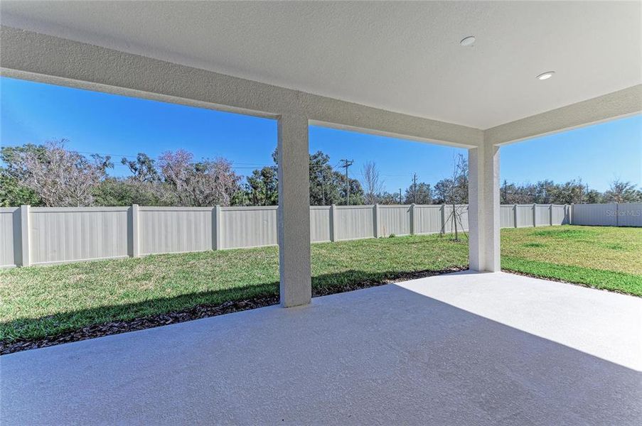 Exterior details and patio area of a home in Crosswind Point, Parrish (Image 3).