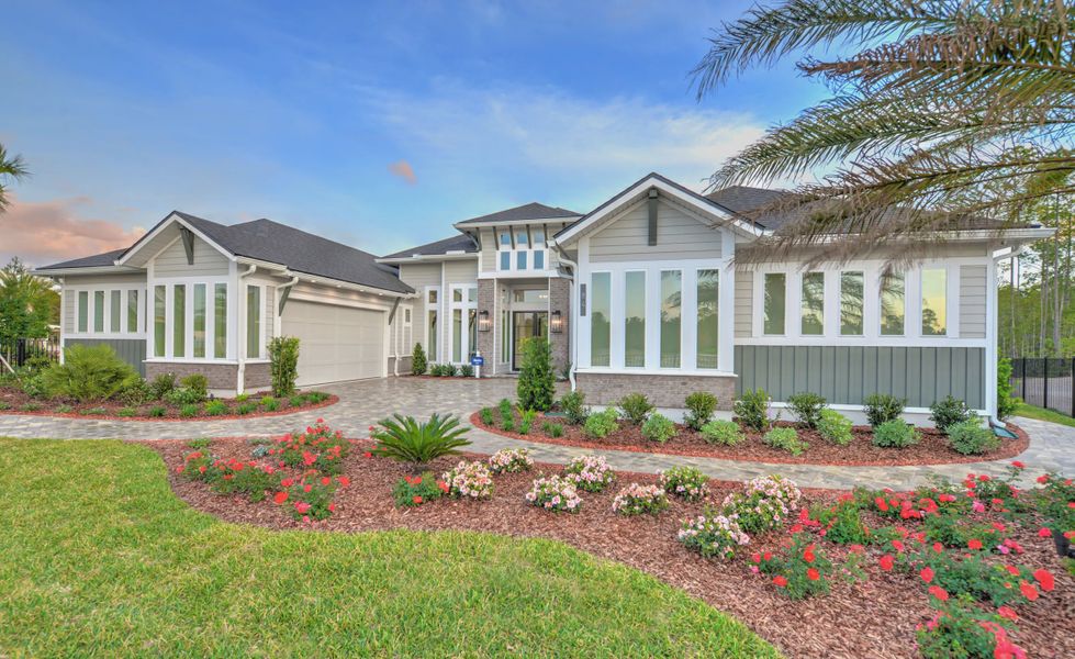 Front exterior of a new home in Courtney Grove, St. Augustine, FL, highlighting curb appeal (Image 22). Front exterior of a new home in Courtney Grove, St. Augustine, FL, highlighting curb appeal (Image 22).