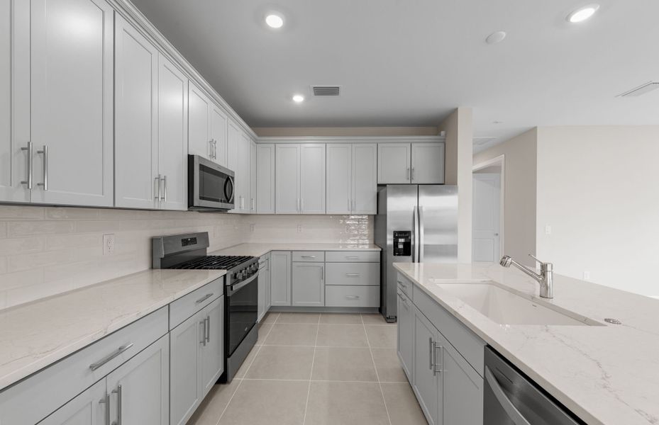 Furnished interior view inside a new home in Del Webb Oak Creek, North Fort Myers (Image 7).
