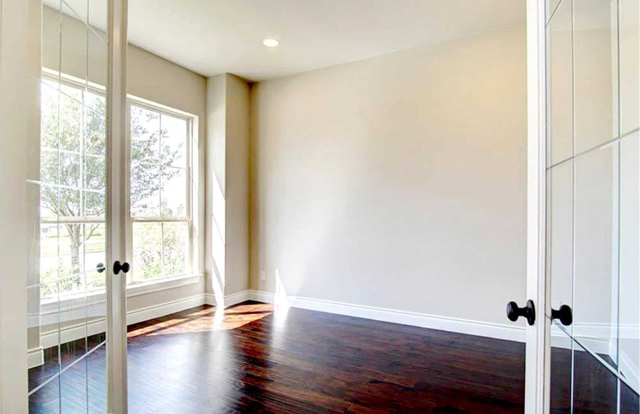 Representative unfurnished interior of a home built from the 4198 by Ravenna Homes in The Woodlands Hills 65′, Willis (Image 14).