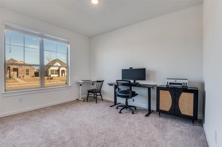 Furnished interior view inside a new home in Prairie Ridge at Goodland, Venus (Image 25).
