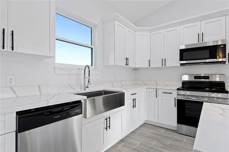 Furnished interior view inside a new home in , Ocala (Image 7).