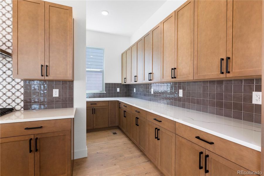 Furnished interior view inside a new home in Dillon Pointe - Journey, Broomfield (Image 13).