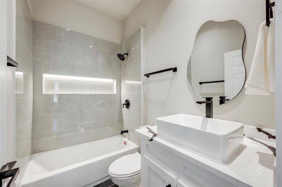 Full bathroom with vanity and shower / bathtub combination