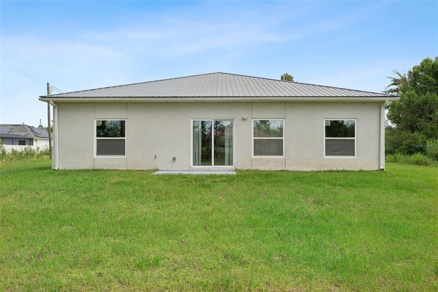 Exterior details and patio area of a home in , Orlando (Image 3).