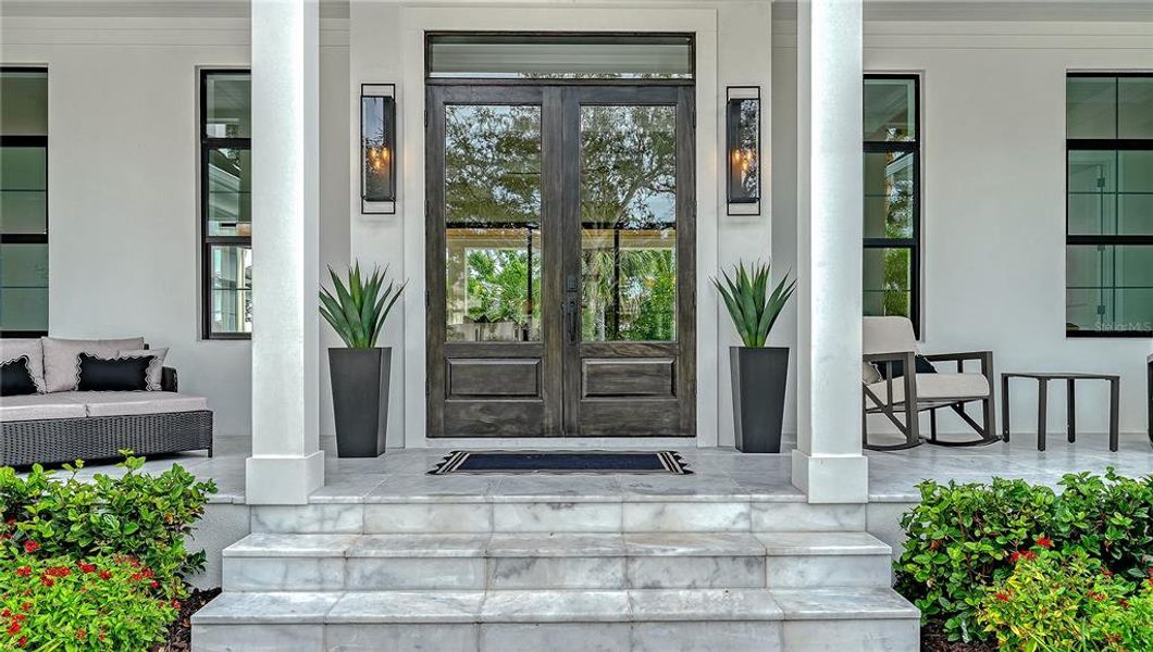 Exterior details and patio area of a home in , Sarasota (Image 28).