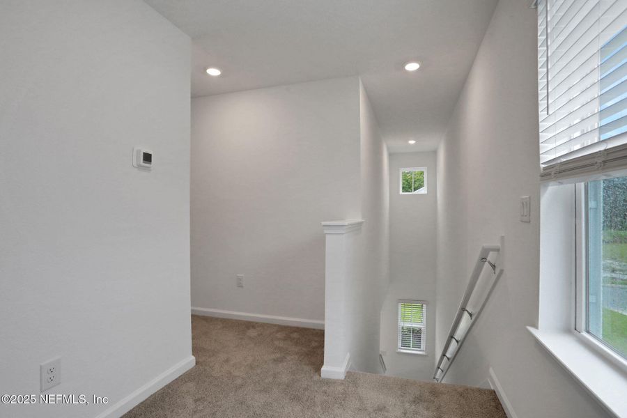 Spacious, unfurnished interior of a new home in TrailMark, St. Augustine (Image 27).