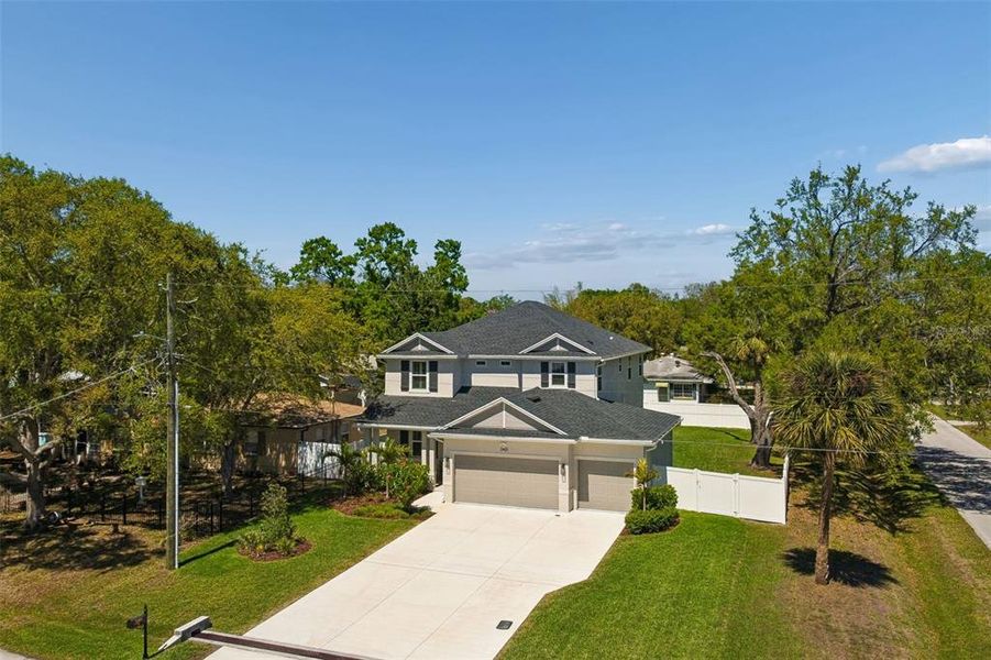 Front exterior of a new home in , Tampa, FL, highlighting curb appeal (Image 24).