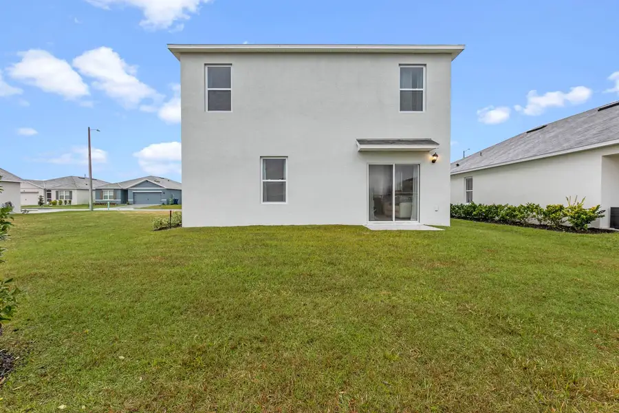 Representative exterior photo of a completed home built from the ROBIE by D.R. Horton in Villamar, Winter Haven, FL (Image 2). Representative exterior photo of a completed home built from the ROBIE by D.R. Horton in Villamar, Winter Haven, FL (Image 2).