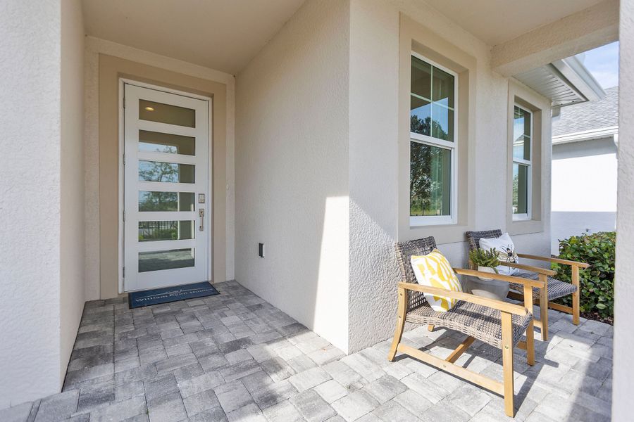 Representative exterior details of a home built from the Charlotte by William Ryan Homes in The Sanctuary – Royal Collection, Punta Gorda (Image 3). Representative exterior details of a home built from the Charlotte by William Ryan Homes in The Sanctuary – Royal Collection, Punta Gorda (Image 3).