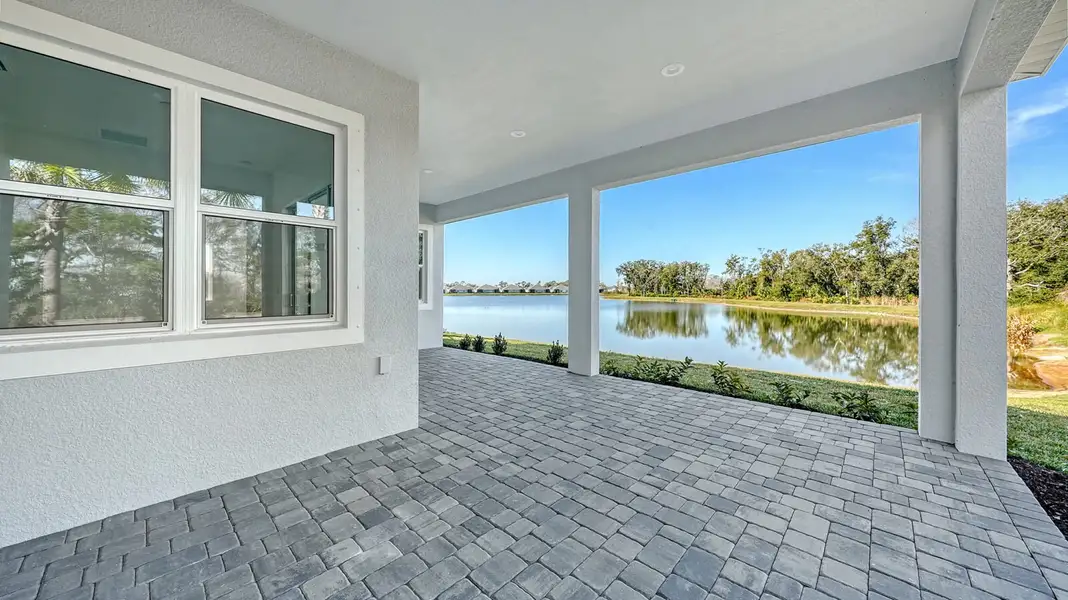 Exterior details and patio area of a home in Wildleaf, Parrish (Image 3).