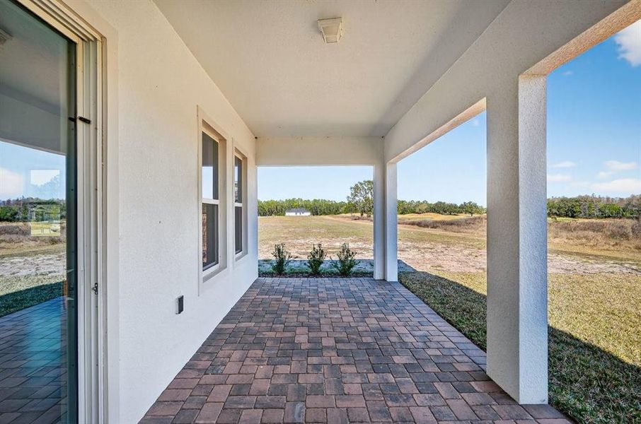 Exterior details and patio area of a home in Gray Hawk at Hole Two, Daytona Beach (Image 3).