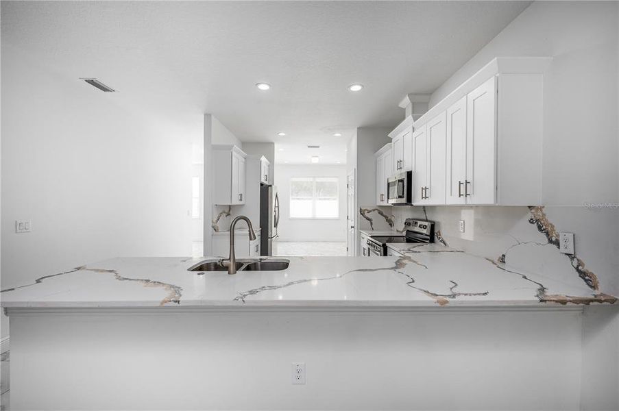 Furnished interior view inside a new home in , Tampa (Image 8).