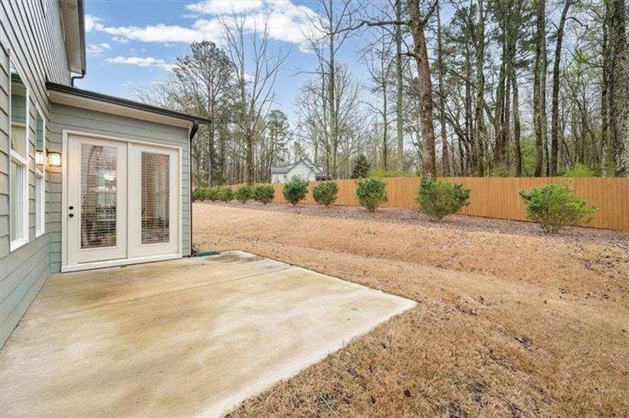 Exterior details and patio area of a home in Enclave at Edgewater, Holly Springs (Image 4). Exterior details and patio area of a home in Enclave at Edgewater, Holly Springs (Image 4).