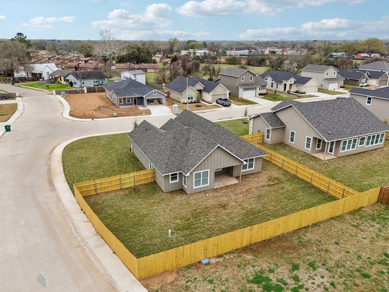 Birds eye view of property with a residential view