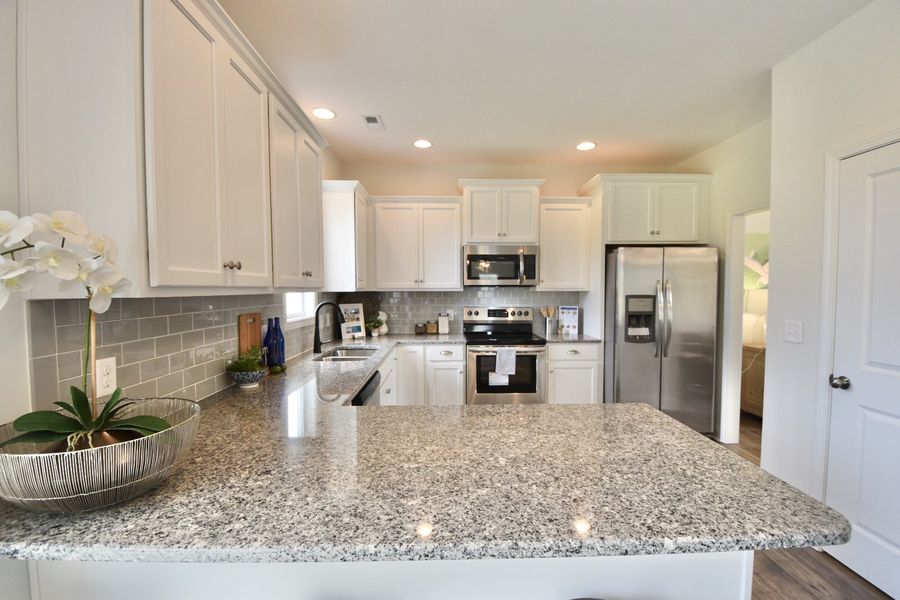 Furnished interior view inside a new home in Patriot’s Watch, Shallotte (Image 13).