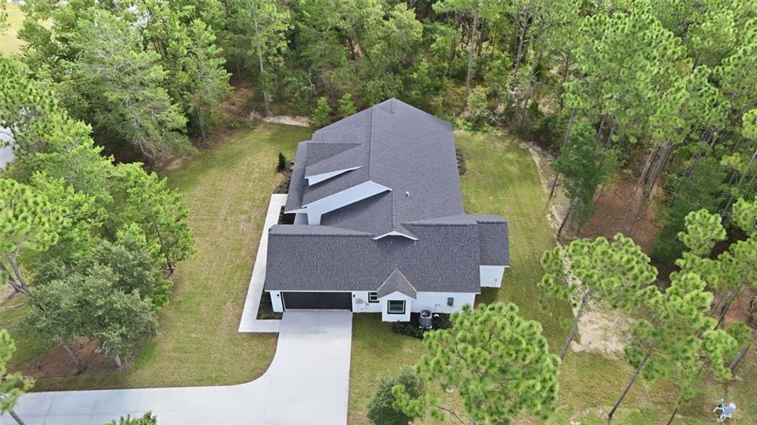 Front exterior of a new home in , Wildwood, FL, highlighting curb appeal (Image 28).