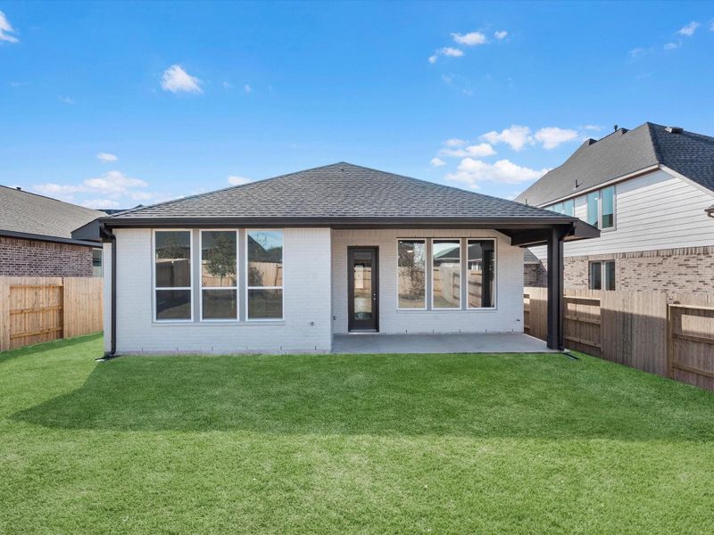 Exterior details and patio area of a home in Garden Glen at Clopton Farms, Montgomery (Image 3).