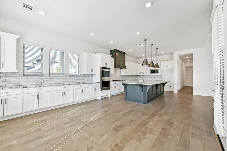 Furnished interior view inside a new home in , Manvel (Image 7).