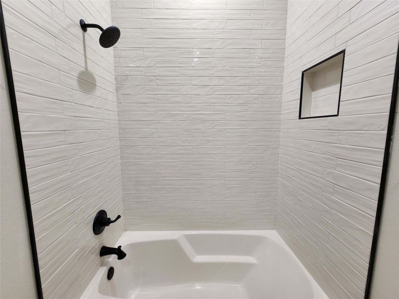 Bathroom with shower / bathtub combination