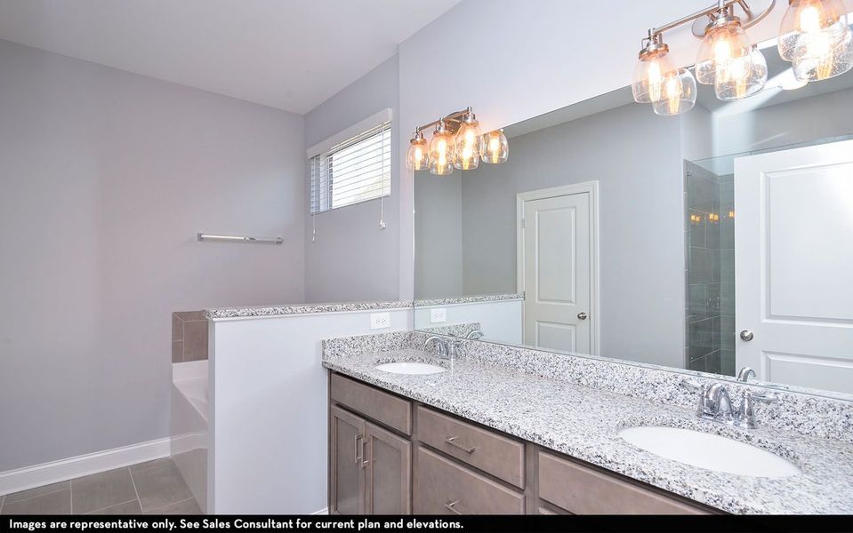 Furnished interior view inside a new home in Aden Woods, Fairview (Image 7).