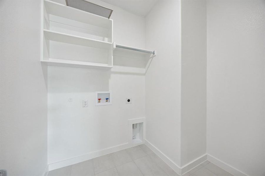 Utility Room in the Masters home plan by Trophy Signature Homes – REPRESENTATIVE PHOTO Utility Room in the Masters home plan by Trophy Signature Homes – REPRESENTATIVE PHOTO