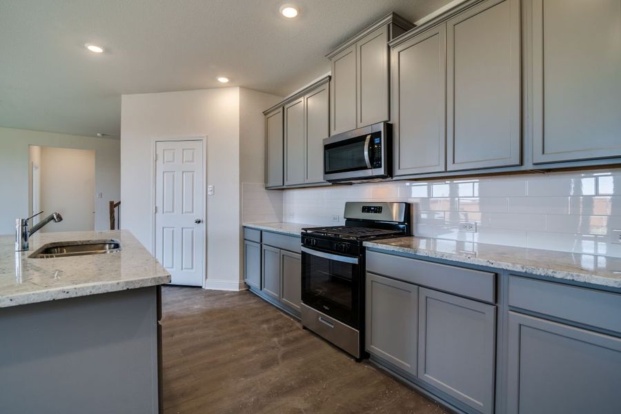 Furnished interior view inside a new home in Heartland Signature, Heartland (Image 5). Furnished interior view inside a new home in Heartland Signature, Heartland (Image 5).