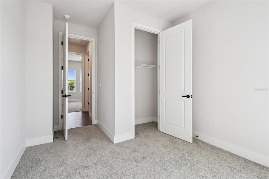 Spacious, unfurnished interior of a new home in Waterset Tradition Series, Apollo Beach (Image 32).