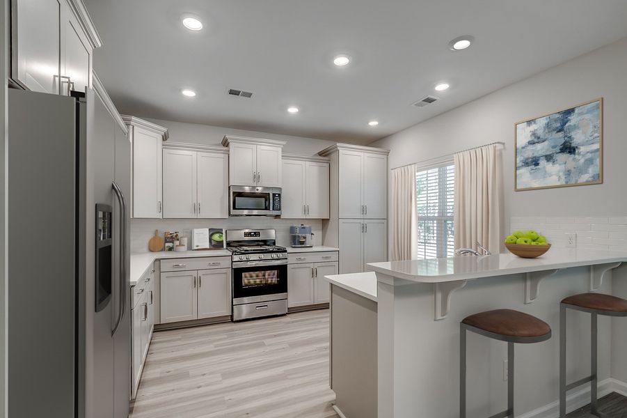 Representative furnished interior of a home built from the Westbury - Premier Collection by Mungo Homes in Winston Ridge, Youngsville (Image 3).