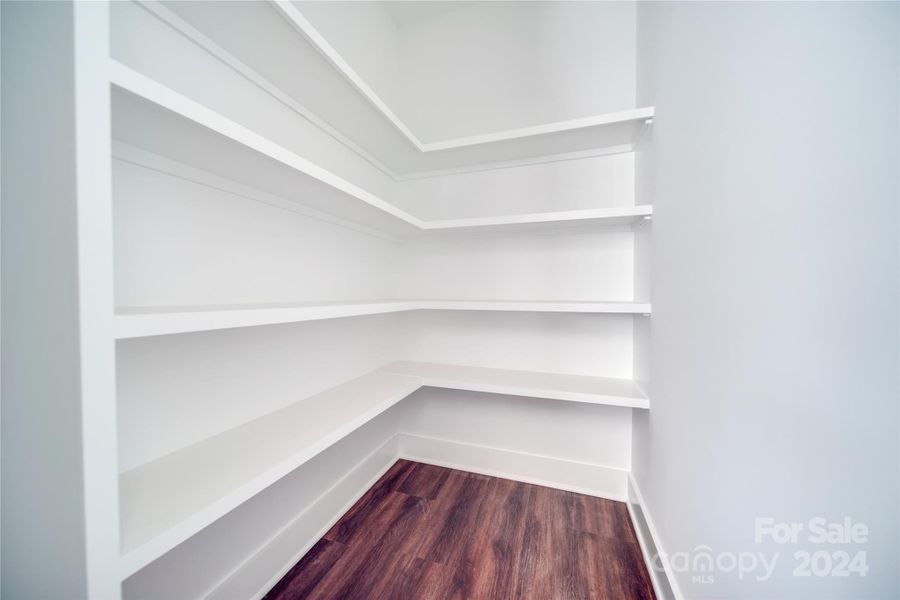 WALK IN PANTRY WITH SOLID WOOD SHELVING