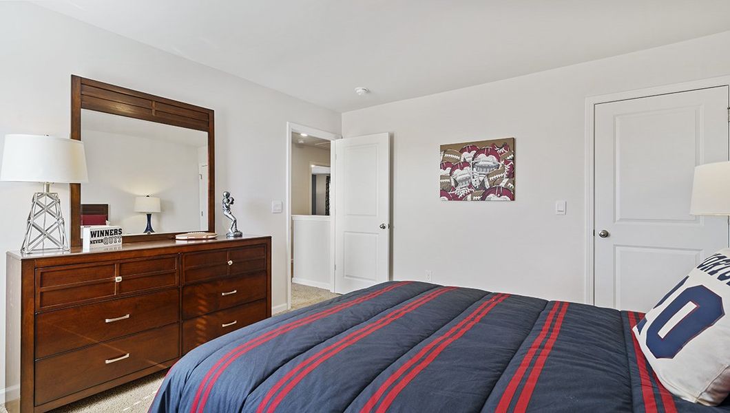 Representative furnished interior of a home built from the Penwell by D.R. Horton in Sage Grove, Lyman (Image 24).