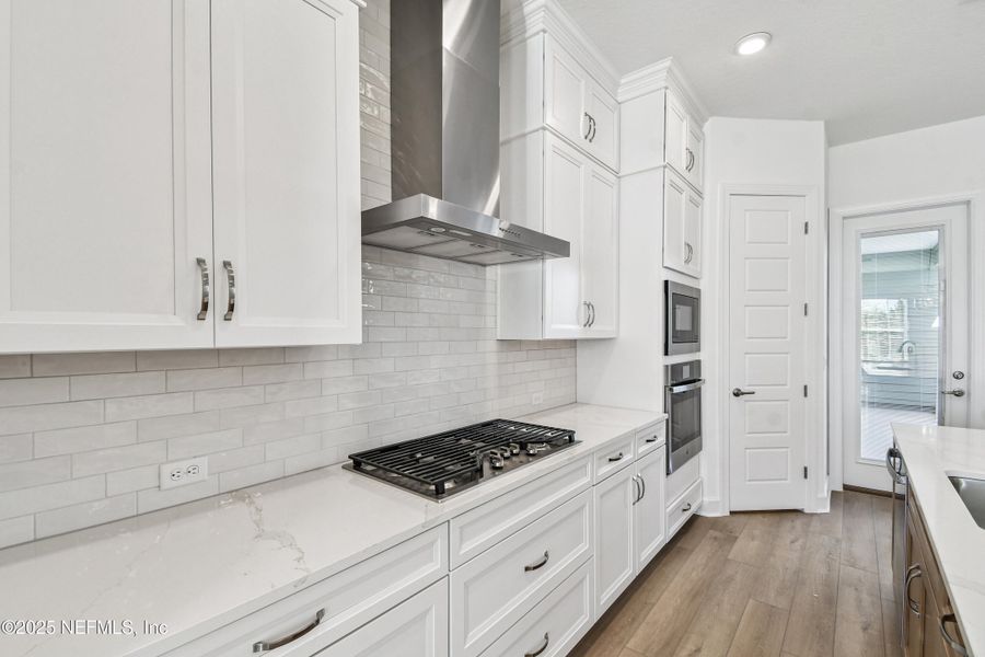 Furnished interior view inside a new home in Seven Pines 24' Rear Entry Townhomes, Jacksonville (Image 5).