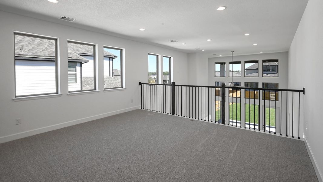 Spacious, unfurnished interior of a new home in 6 Creeks 50', Kyle (Image 18).