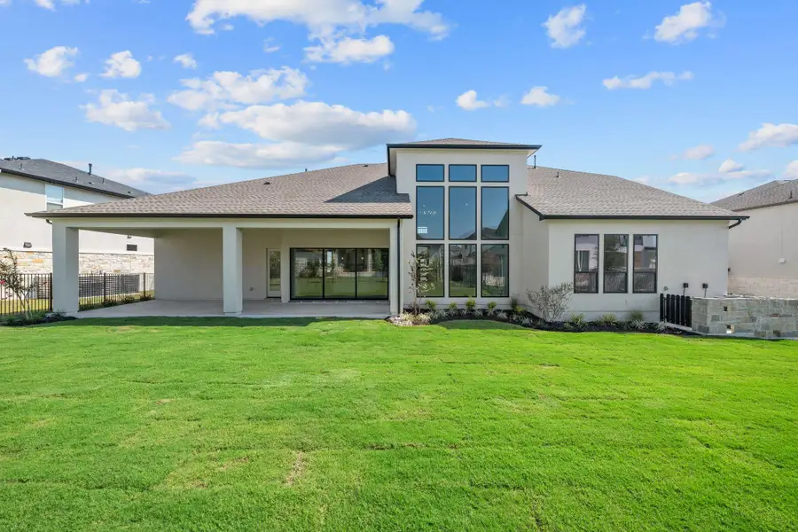 Exterior details and patio area of a home in Rough Hollow - Las Brisas, Austin (Image 2). Exterior details and patio area of a home in Rough Hollow - Las Brisas, Austin (Image 2).