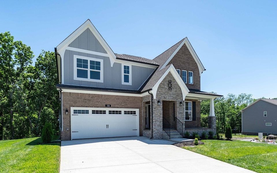 Front exterior of a new home in The Retreat at Norman Farm, Hendersonville, TN, highlighting curb appeal (Image 2).