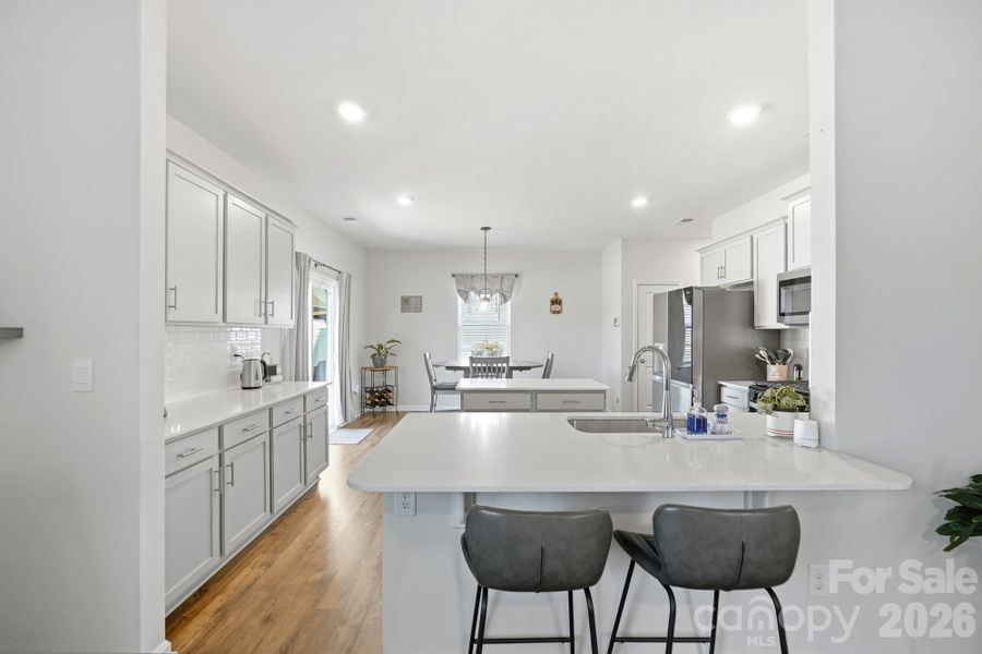 The oversized island offers plenty of seating for family and guests. The oversized island offers plenty of seating for family and guests.