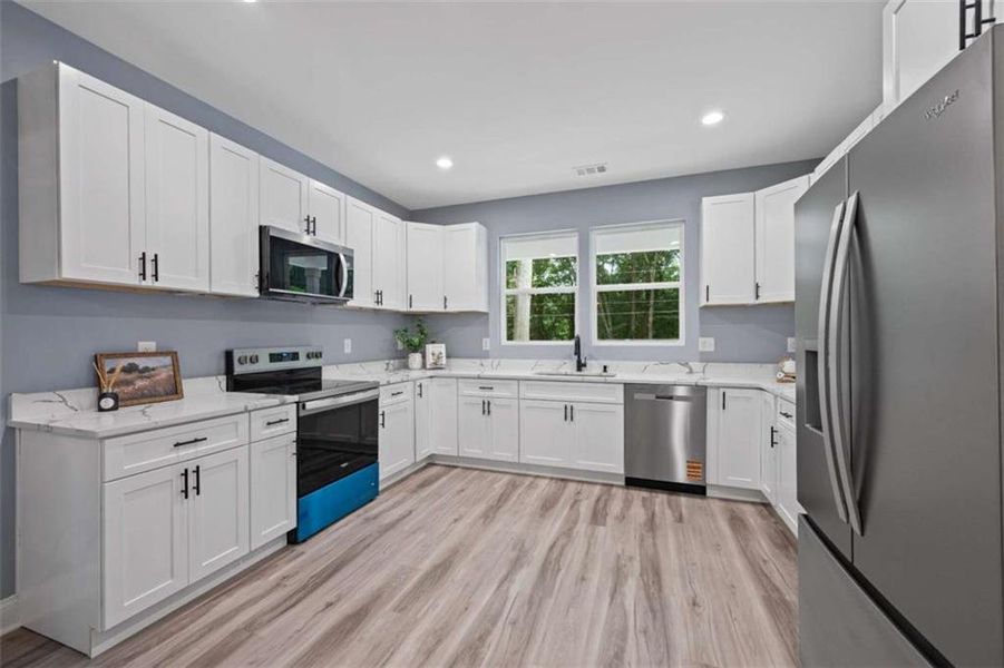 Furnished interior view inside a new home in , Commerce (Image 6).