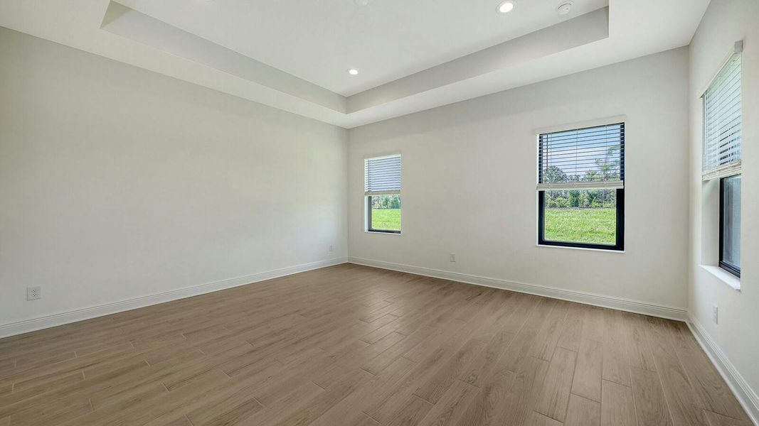 Spacious, unfurnished interior of a new home in Palm Grove Real Estate and Homes for Sale in Lakewood Ranch, FL - Neal Communities, Lakewood Ranch (Image 50).