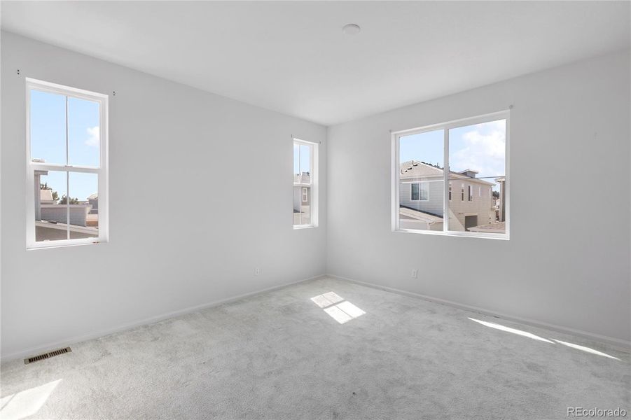 Upper level primary bedroom