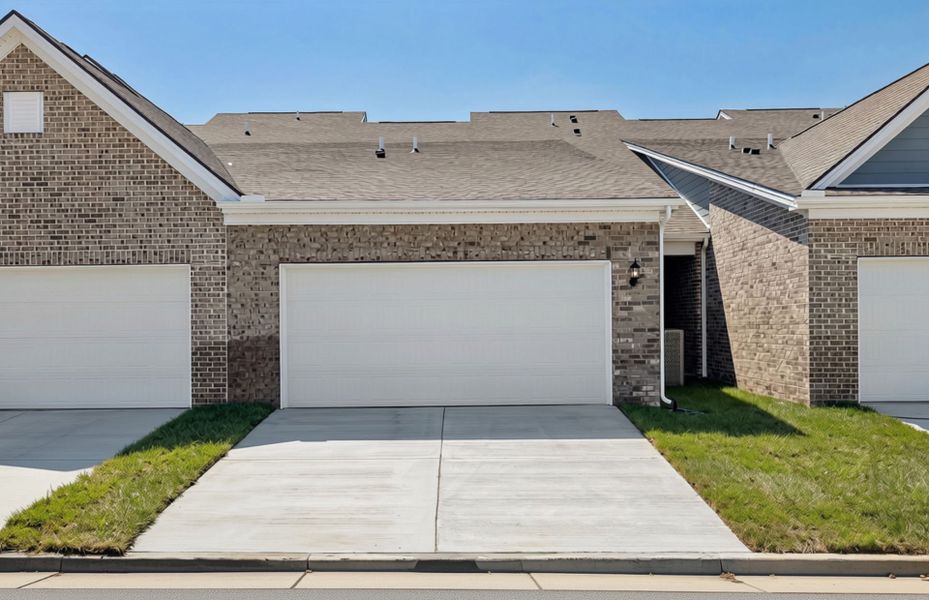 Front exterior of a new home in Bradshaw Farms Reserve, Mount Juliet, TN, highlighting curb appeal (Image 21). Front exterior of a new home in Bradshaw Farms Reserve, Mount Juliet, TN, highlighting curb appeal (Image 21).