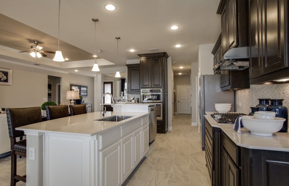 Abundant cabinet space in the island kitchen