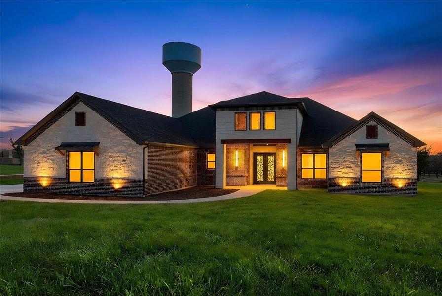 Front exterior of a new home in , Granbury, TX, highlighting curb appeal (Image 28).