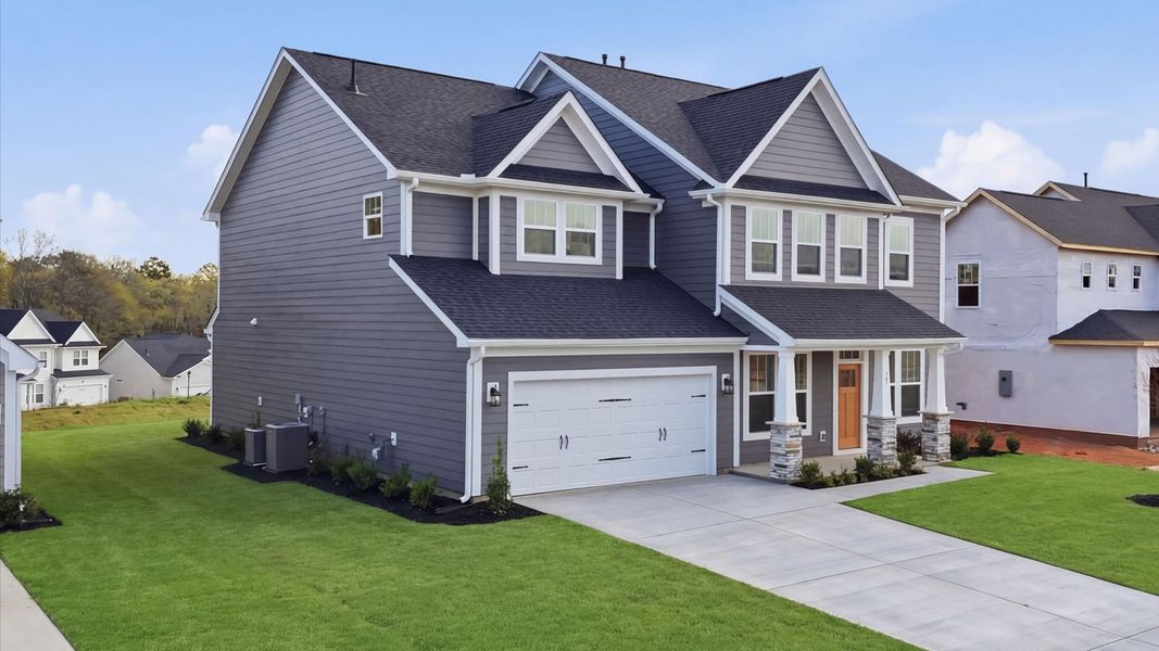 Front exterior of a new home in Kayfield at Midway, Anderson, SC, highlighting curb appeal (Image 20).