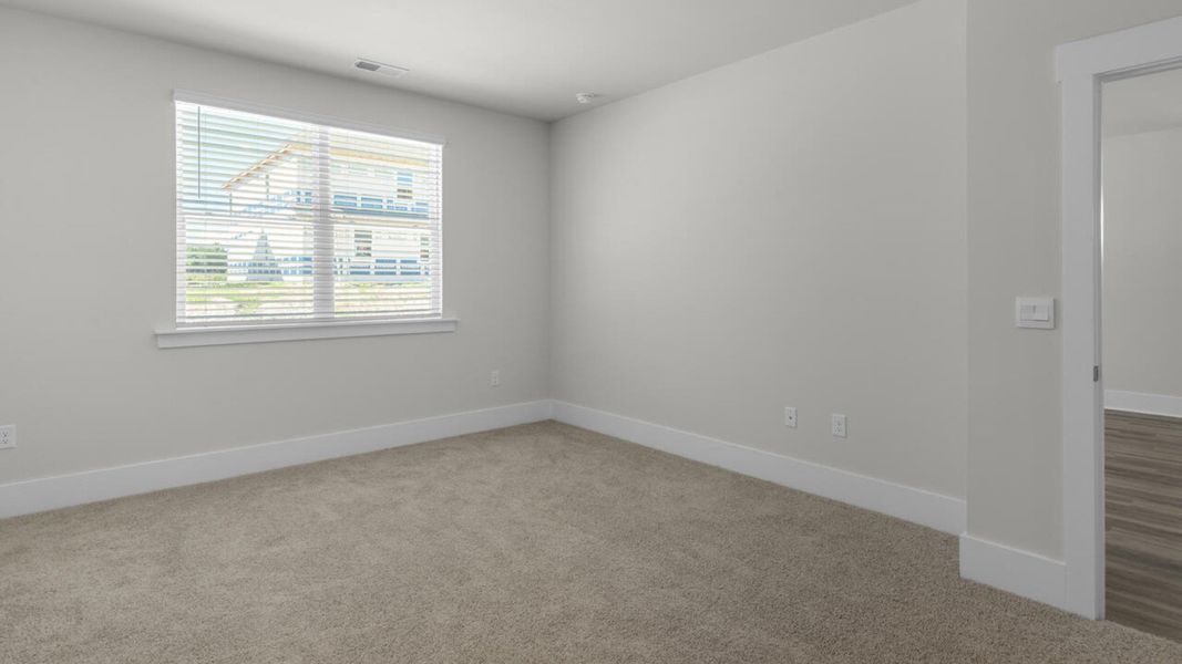 Spacious, unfurnished interior of a new home in Surfside Landing, Hubert (Image 16).