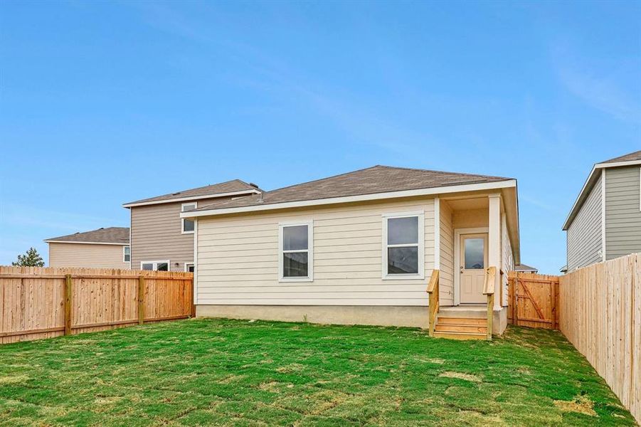 Exterior details and patio area of a home in Windmill Farms, Forney (Image 4).