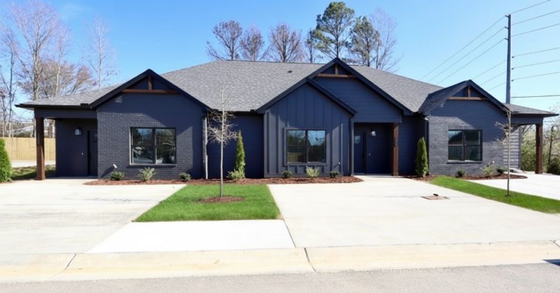 Front exterior of a new home in The Nassau, Chattanooga, TN, highlighting curb appeal (Image 22). Front exterior of a new home in The Nassau, Chattanooga, TN, highlighting curb appeal (Image 22).