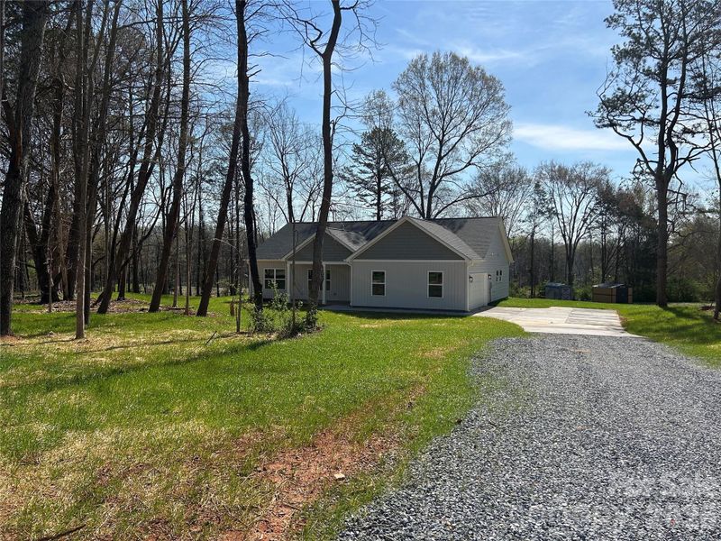 Front exterior of a new home in , Shelby, NC, highlighting curb appeal (Image 22).