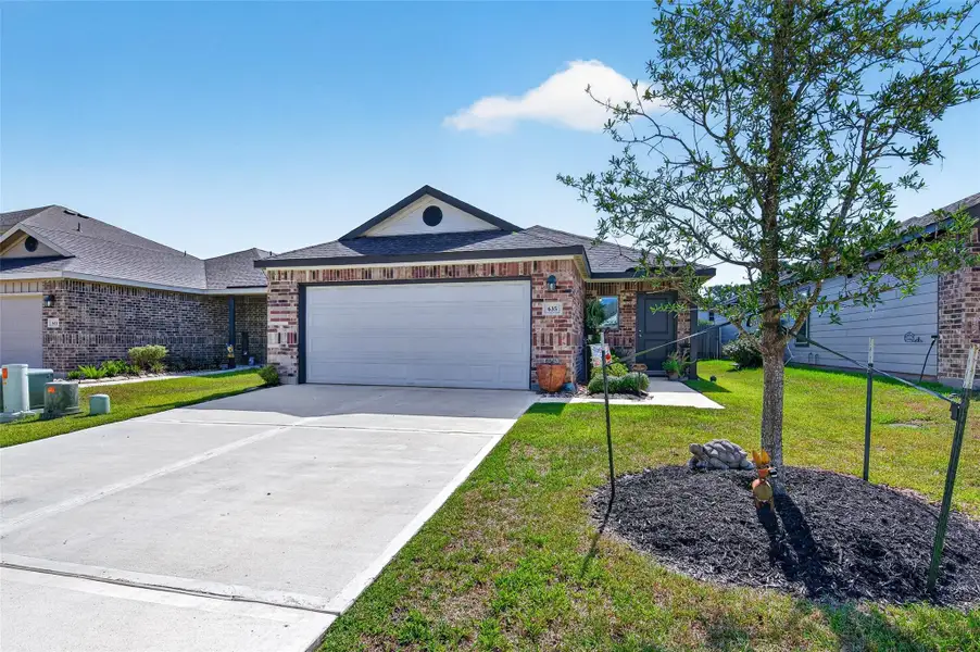 Front exterior of a new home in , Montgomery, TX, highlighting curb appeal (Image 2). Front exterior of a new home in , Montgomery, TX, highlighting curb appeal (Image 2).
