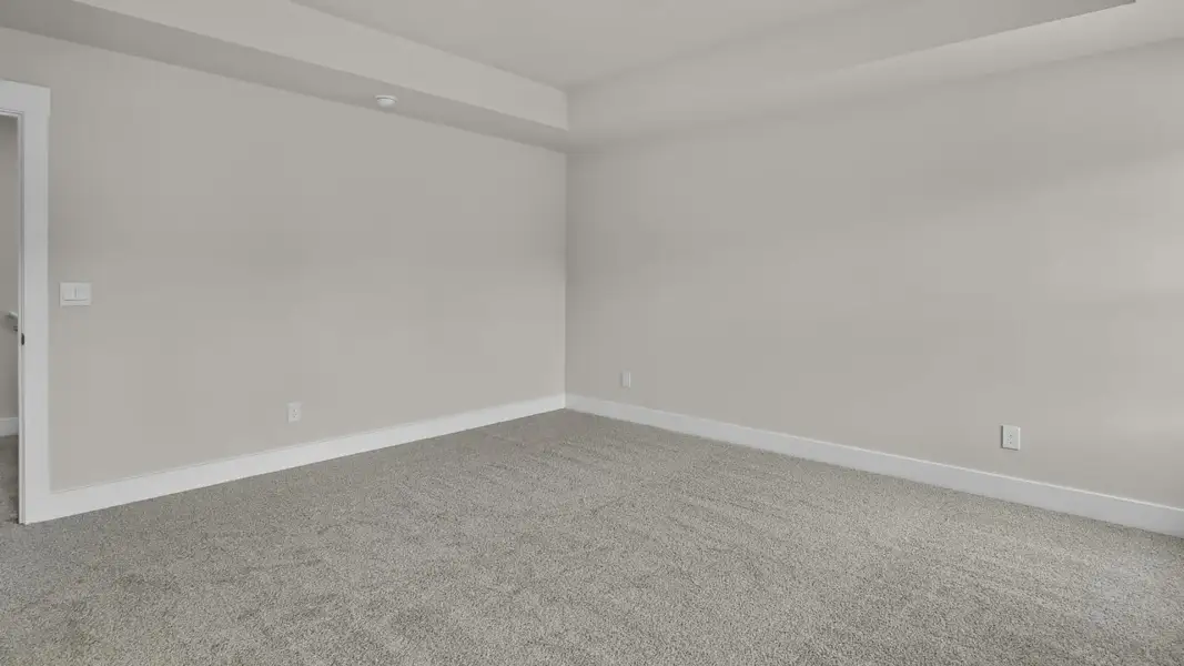 Representative unfurnished interior of a home built from the Forrester by D.R. Horton in The Highlands at Cedar Hill Landing, Navassa (Image 27).