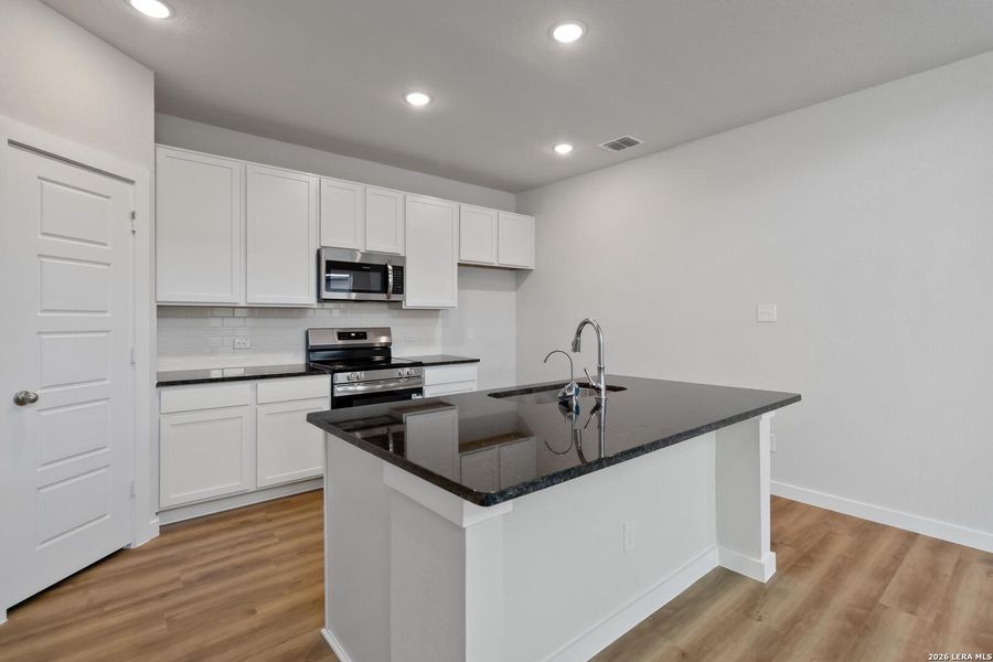 Furnished interior view inside a new home in Red Hawk Landing, San Antonio (Image 12).
